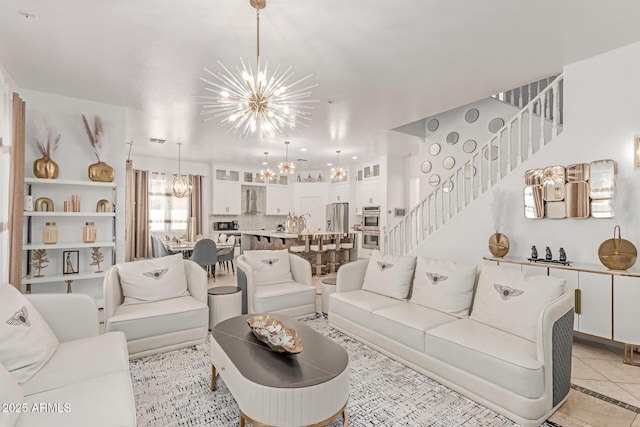 84 E Joseph Way, Gilbert, AZ 85295 - living area with a chandelier, stairway, and light tile patterned flooring
