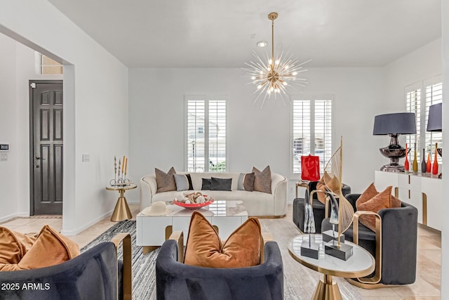 84 E Joseph Way, Gilbert, AZ 85295 - living area with a chandelier, light tile patterned flooring, and plenty of natural light