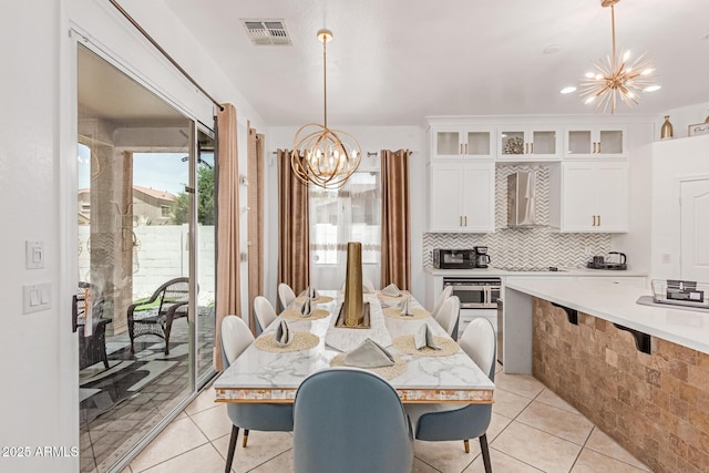 84 E Joseph Way, Gilbert, AZ 85295 - dining space with a chandelier and light tile patterned flooring