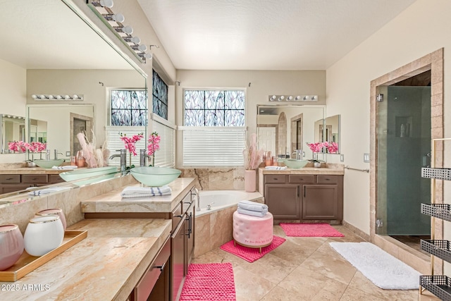 84 E Joseph Way, Gilbert, AZ 85295 - full bathroom with a bath, two vanities, a stall shower, and tile patterned flooring