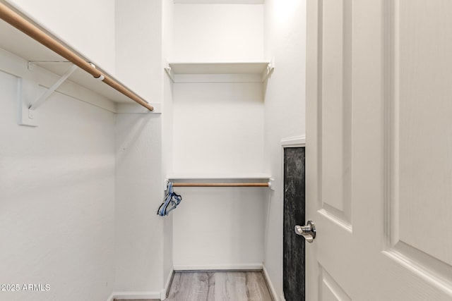 84 E Joseph Way, Gilbert, AZ 85295 - walk in closet with wood finished floors