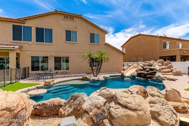 84 E Joseph Way, Gilbert, AZ 85295 - view of swimming pool with a water slide and a patio area