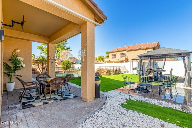 84 E Joseph Way, Gilbert, AZ 85295 - fenced backyard featuring a gazebo, a patio, and outdoor dining space