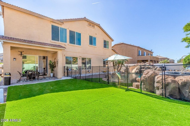 84 E Joseph Way, Gilbert, AZ 85295 - rear view of property featuring stucco siding, a tiled roof, and a patio
