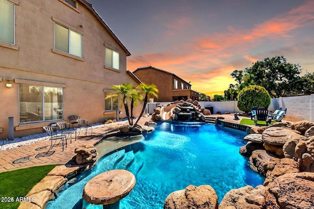 84 E Joseph Way, Gilbert, AZ 85295 - pool at dusk with a fenced backyard and a patio area