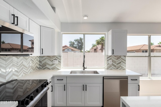 5125 W Wickiup Ln, Glendale, AZ 85308 - kitchen with stainless steel dishwasher, electric stove, a sink, and healthy amount of natural light