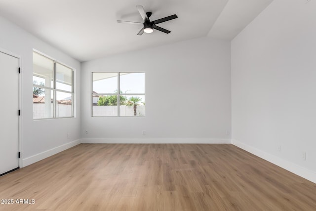 5125 W Wickiup Ln, Glendale, AZ 85308 - empty room featuring lofted ceiling, light wood-type flooring, baseboards, and a ceiling fan