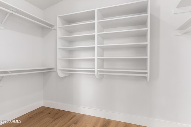 5125 W Wickiup Ln, Glendale, AZ 85308 - walk in closet with wood finished floors