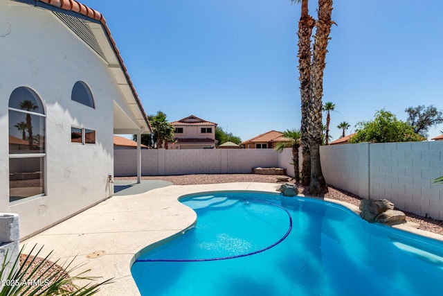 5125 W Wickiup Ln, Glendale, AZ 85308 - view of swimming pool featuring a patio and a fenced backyard