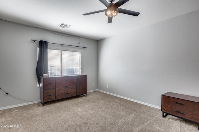 bedroom with baseboards, visible vents, ceiling fan, and carpet flooring