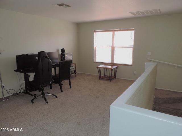 office with visible vents, carpet floors, and baseboards