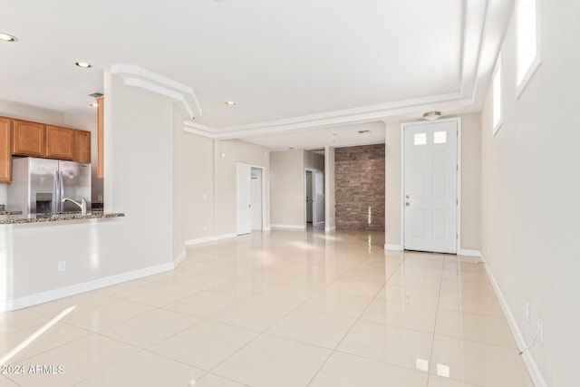 interior space with light tile patterned floors