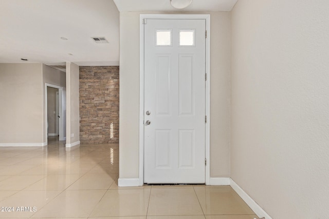 view of tiled foyer entrance