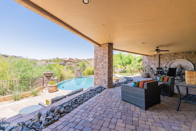 view of patio / terrace featuring ceiling fan