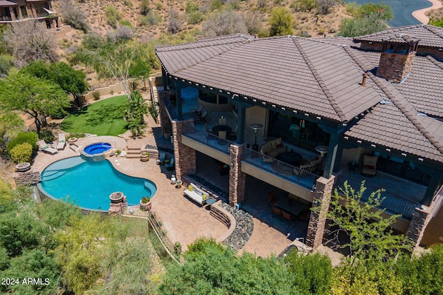 view of pool featuring a patio