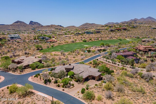 birds eye view of property featuring a mountain view