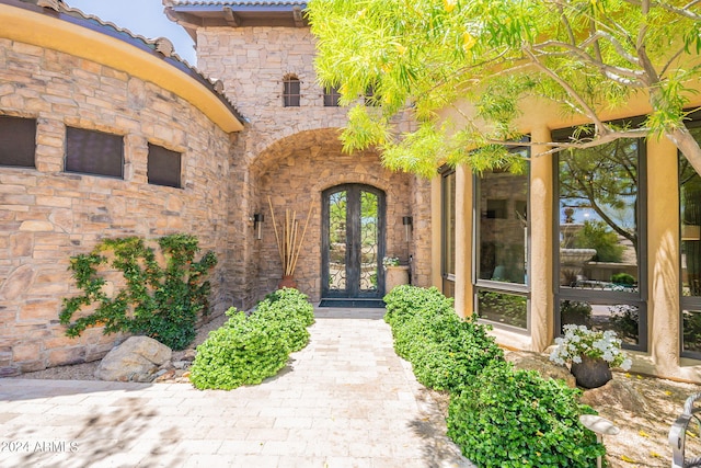 doorway to property featuring french doors