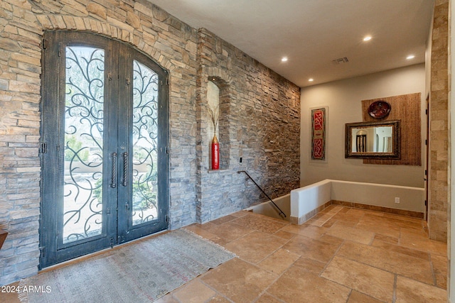 foyer featuring french doors