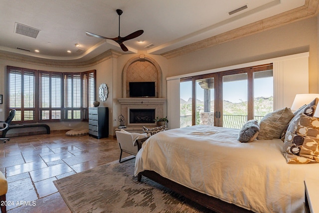 bedroom featuring ornamental molding, ceiling fan, french doors, and access to exterior