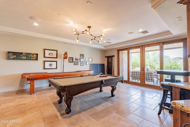 playroom with french doors, a raised ceiling, pool table, and a chandelier