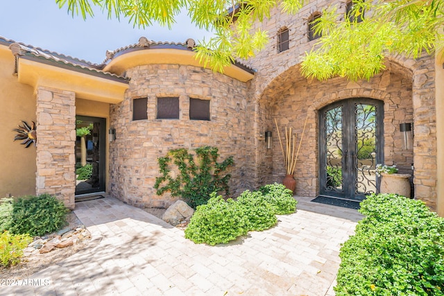 doorway to property featuring french doors