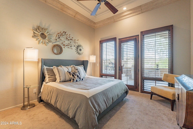 bedroom with ceiling fan, light colored carpet, and access to exterior