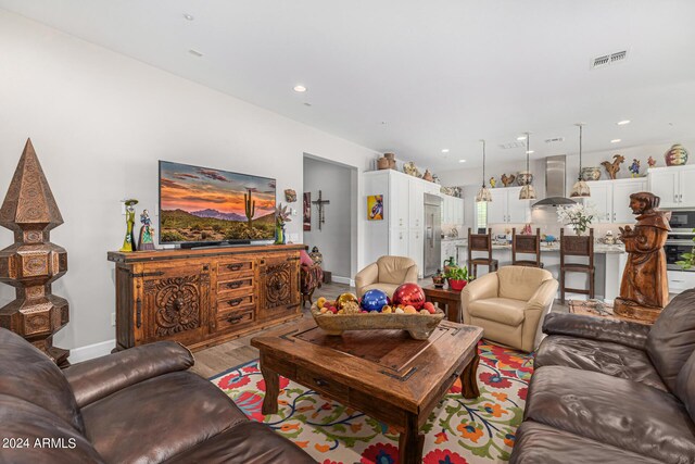 living room with hardwood / wood-style flooring