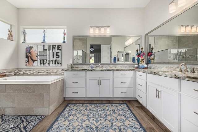 interior details with stainless steel appliances and hardwood / wood-style floors