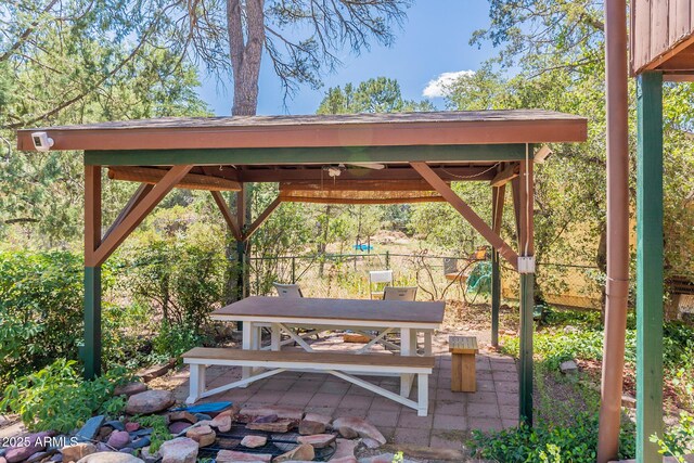 923 N Easy St, Payson, AZ 85541 - view of patio / terrace featuring a gazebo, fence, and outdoor dining area