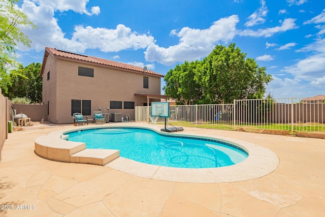 10566 E Bogart Ave, Mesa, AZ 85208 - view of swimming pool with a patio, a fenced backyard, and central air condition unit