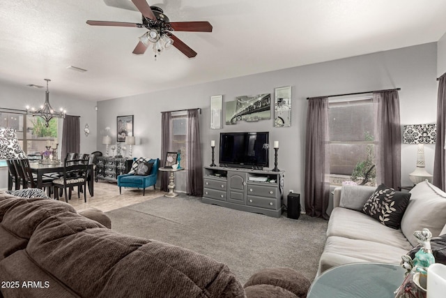10566 E Bogart Ave, Mesa, AZ 85208 - living room with a chandelier, carpet flooring, and a ceiling fan