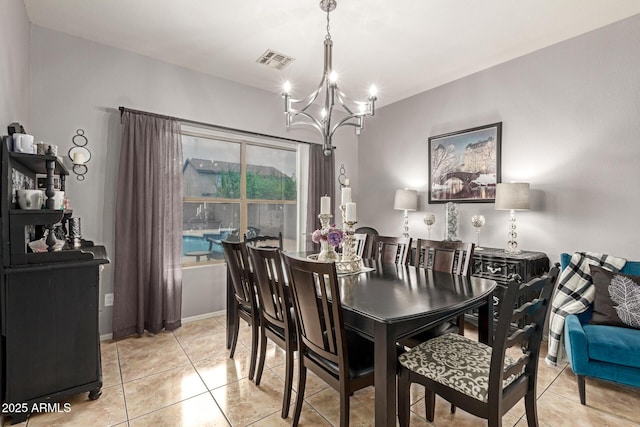 10566 E Bogart Ave, Mesa, AZ 85208 - dining area featuring a chandelier and light tile patterned floors