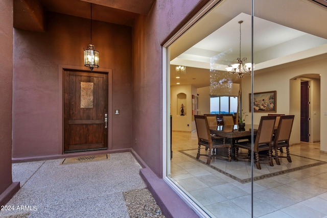 property entrance with a patio