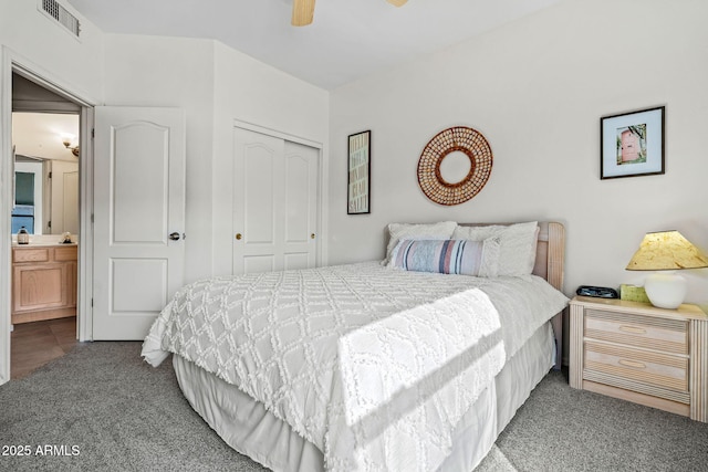 bedroom with a ceiling fan, carpet, visible vents, and a closet