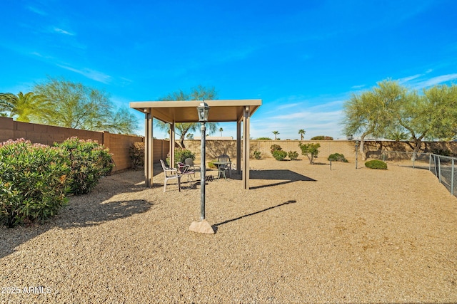 view of play area with a fenced backyard