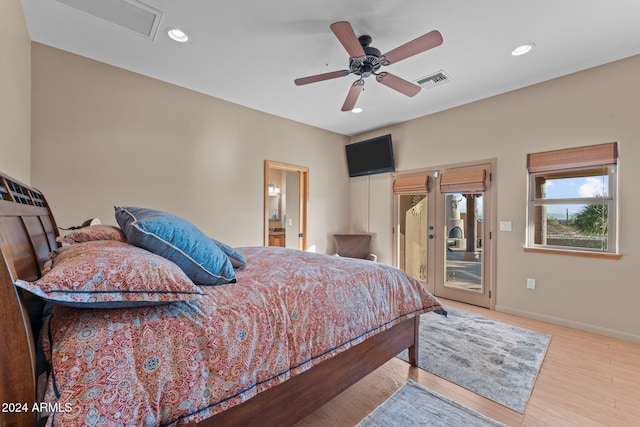 bedroom featuring access to exterior, ceiling fan, and light wood-type flooring