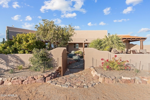 view of adobe home