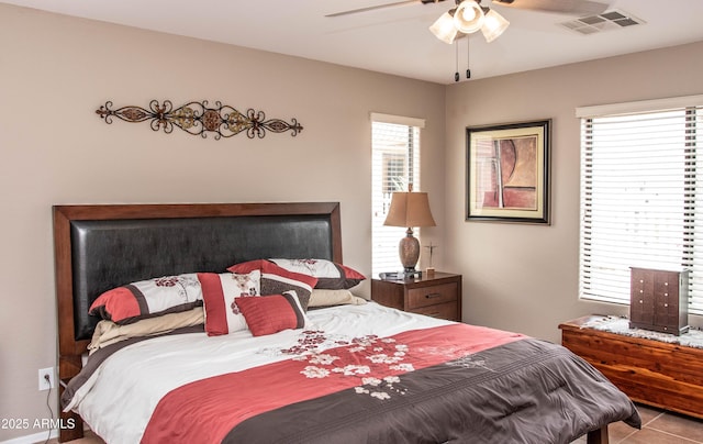 2101 S Meridian Rd Unit 176, Apache Junction, AZ 85120 - bedroom with ceiling fan and tile patterned flooring