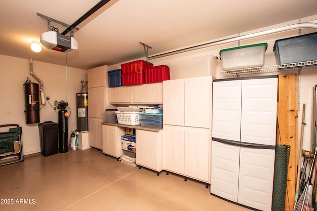 2101 S Meridian Rd Unit 176, Apache Junction, AZ 85120 - garage featuring a garage door opener, a central vacuum unit, and water heater
