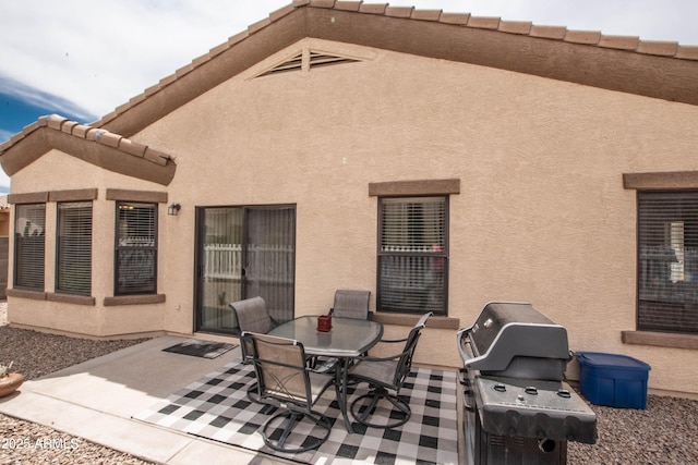 2101 S Meridian Rd Unit 176, Apache Junction, AZ 85120 - view of patio featuring outdoor dining area and grilling area