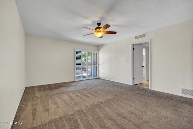 empty room with light carpet and ceiling fan