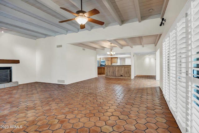 unfurnished living room featuring wood ceiling, ceiling fan with notable chandelier, and beamed ceiling