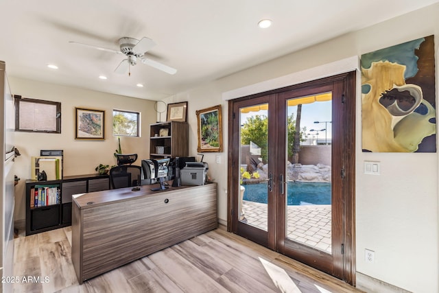 office area with french doors, ceiling fan, and light hardwood / wood-style floors