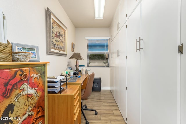 office space with light hardwood / wood-style flooring