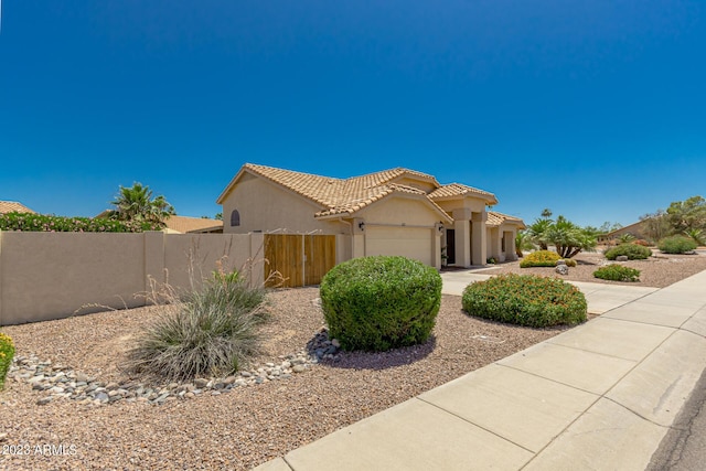 view of front of house with a garage