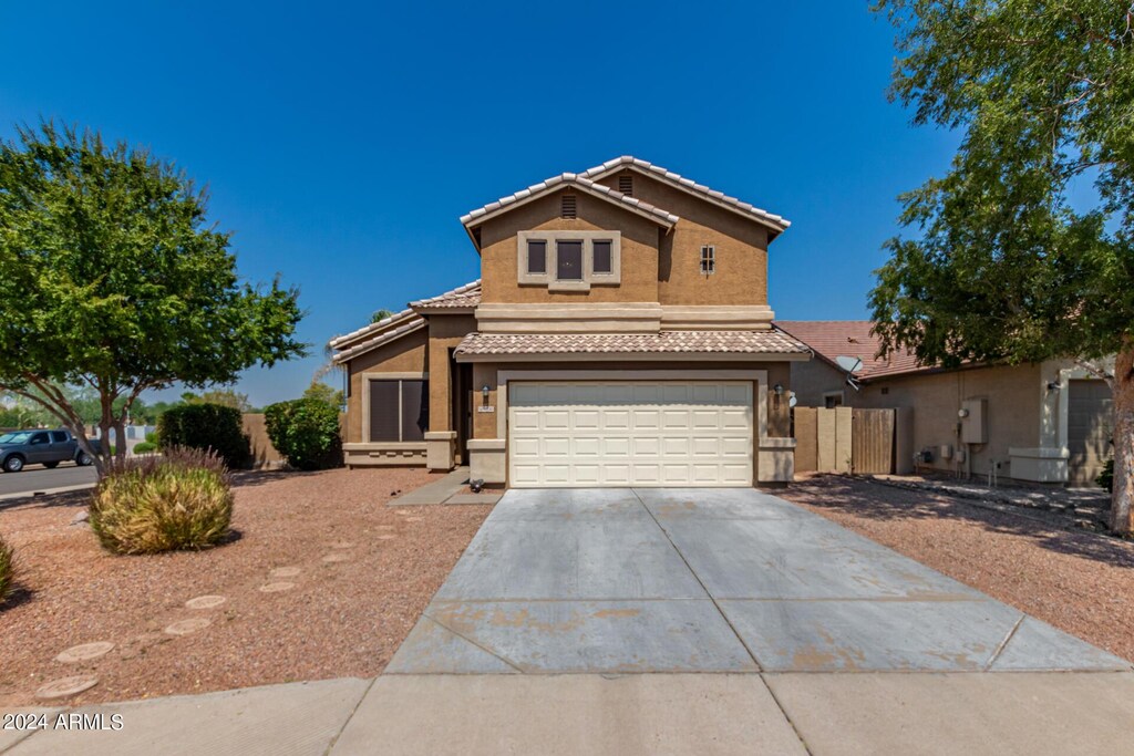 front facade with a garage