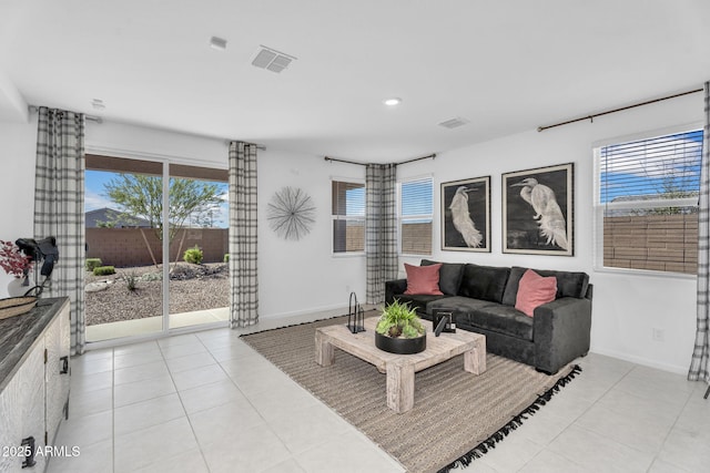 3309 E Malibu Dr, San Tan Valley, AZ 85143 - living room with visible vents, baseboards, and light tile patterned flooring
