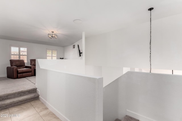 9100 E Captain Dreyfus Ave, Scottsdale, AZ 85260 - corridor featuring baseboards, light tile patterned floors, and stairs