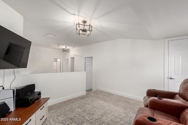 9100 E Captain Dreyfus Ave, Scottsdale, AZ 85260 - living area with light colored carpet, baseboards, and lofted ceiling