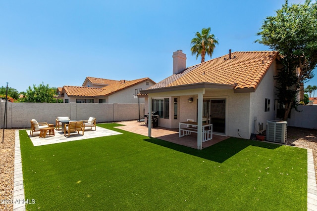 9100 E Captain Dreyfus Ave, Scottsdale, AZ 85260 - rear view of house with central air condition unit, a patio, a tile roof, stucco siding, and a chimney